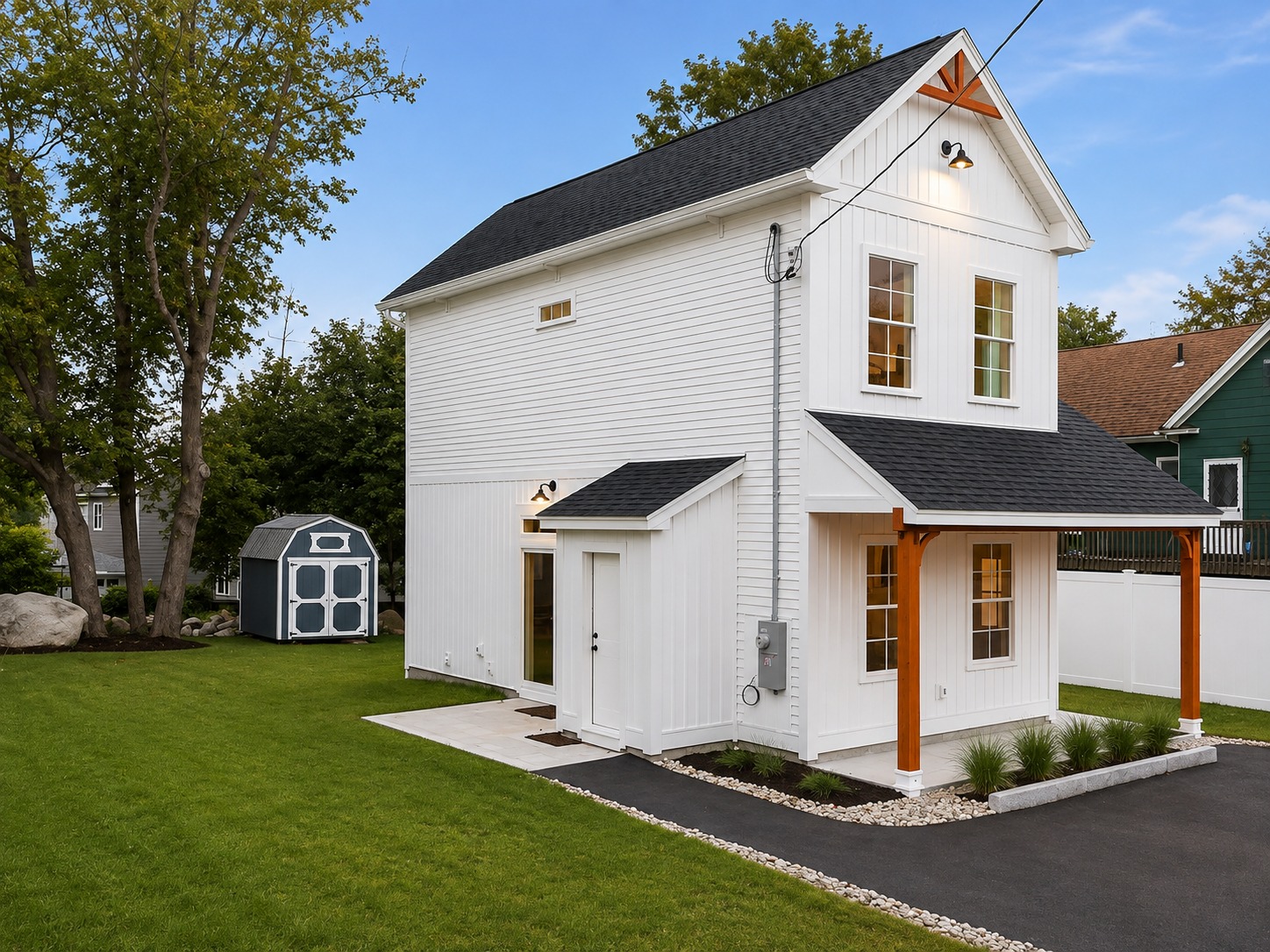 Exterior, side and rear view with storage shed