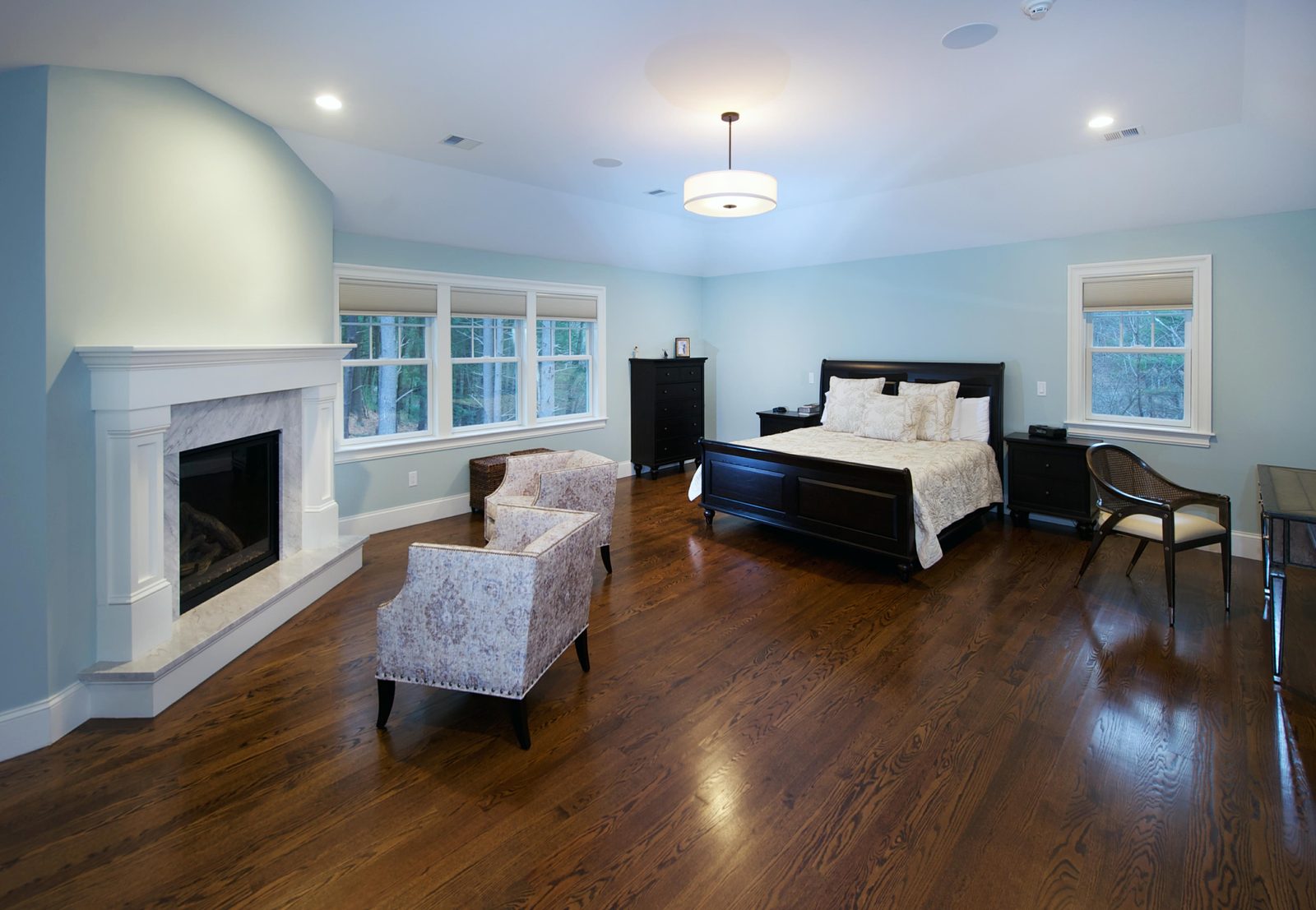 Primary bedroom suite with fireplace