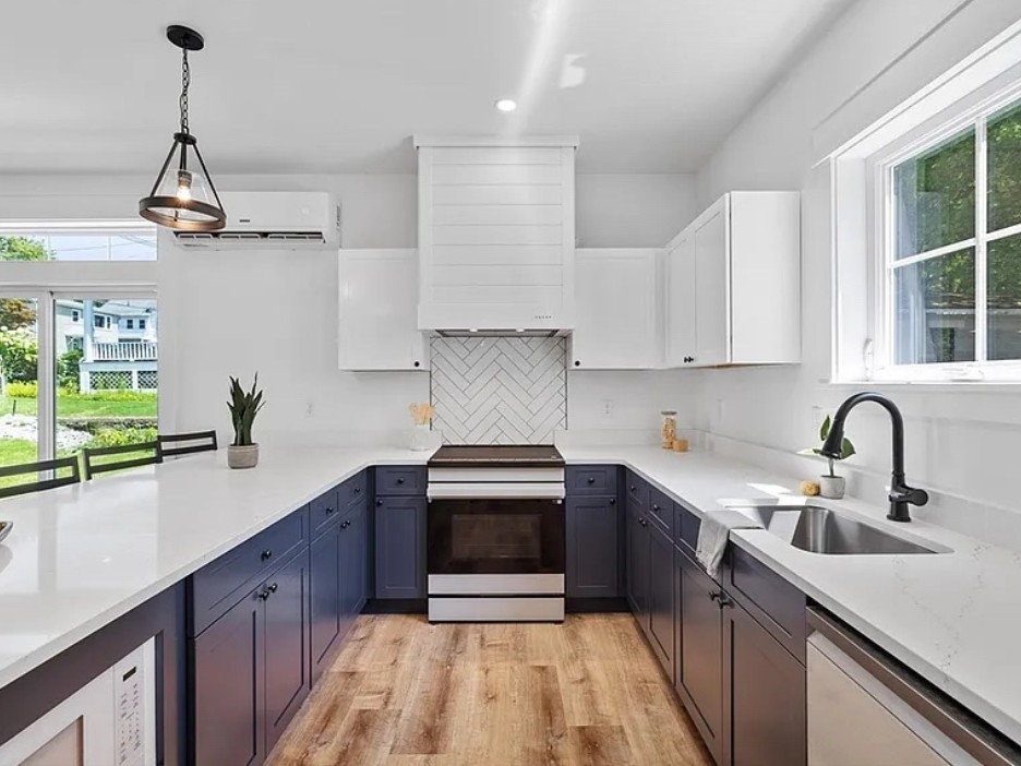 Kitchen with herringbone tile backsplash